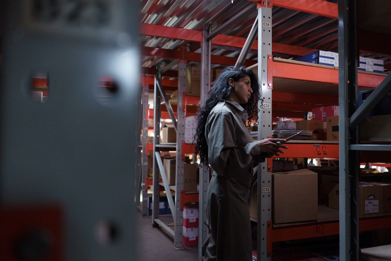 A woman checking the inventory performance index score